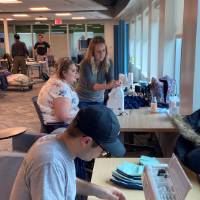 Volunteers sewing masks